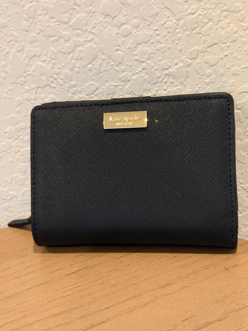 kate spade saffiano leather compact wallet with gold plaque
